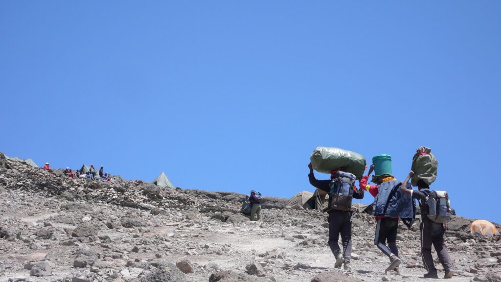 Mount,Kilimanjaro,/,Tanzania:,5,January,2016:,Porters,Carry,Equipment