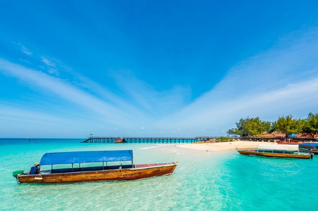 Colorful,Exotic,Seascape,With,Boats,Near,Zanzibar,Shore,In,Africa