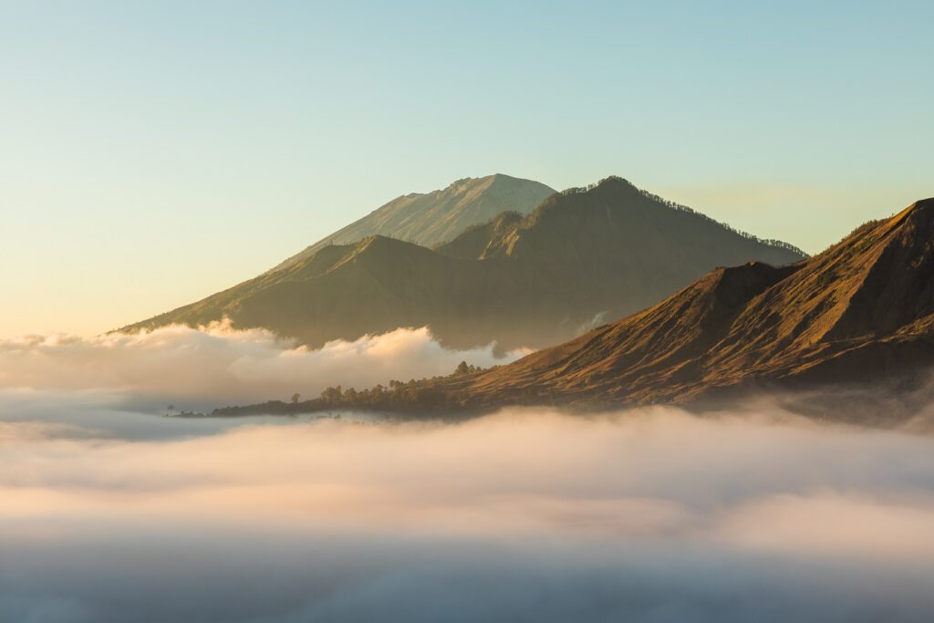 Sunrise,View,Of,Mount,Batur,,Abang,And,Agung,Volcano,In