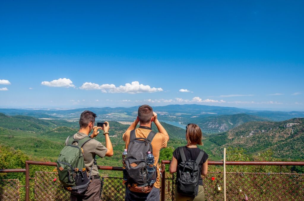 Three,Backpackers,Photographing,The,Landscape,From,Dobogók?,Lookout,,Hungary