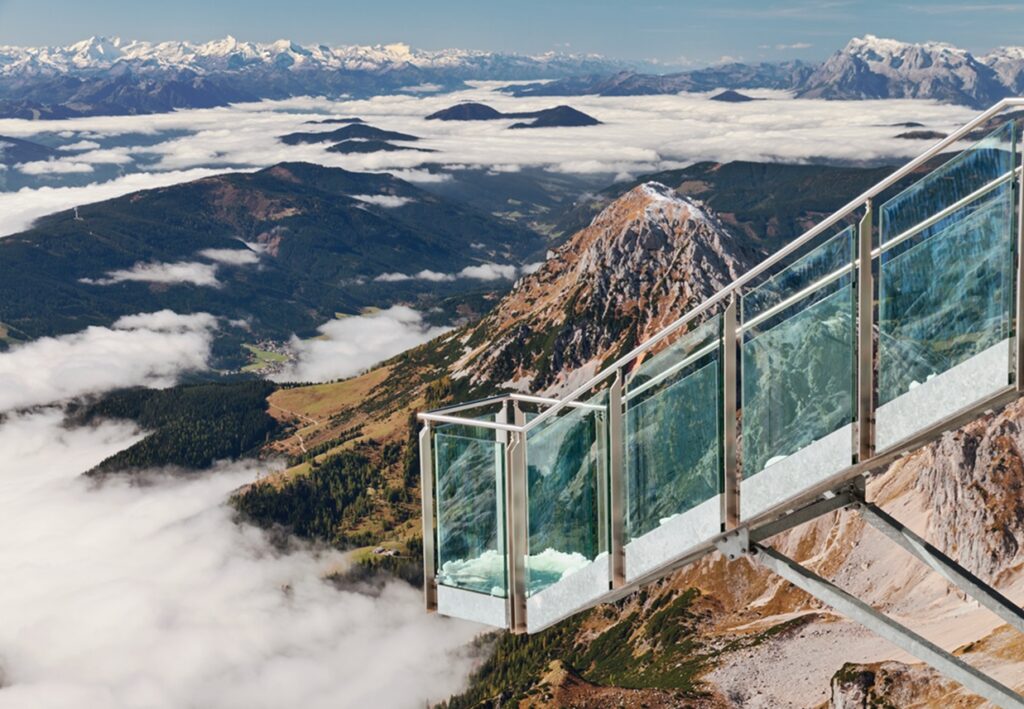 Glass,Balcony,Over,The,Clouds,At,Dachstein,Glacier,,Near,Schladming,