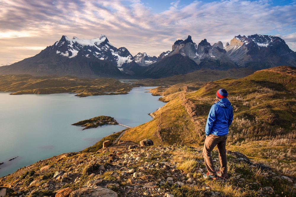 Solo,Traveler,Relaxing,And,Meditating,In,Front,Of,The,Patagonian