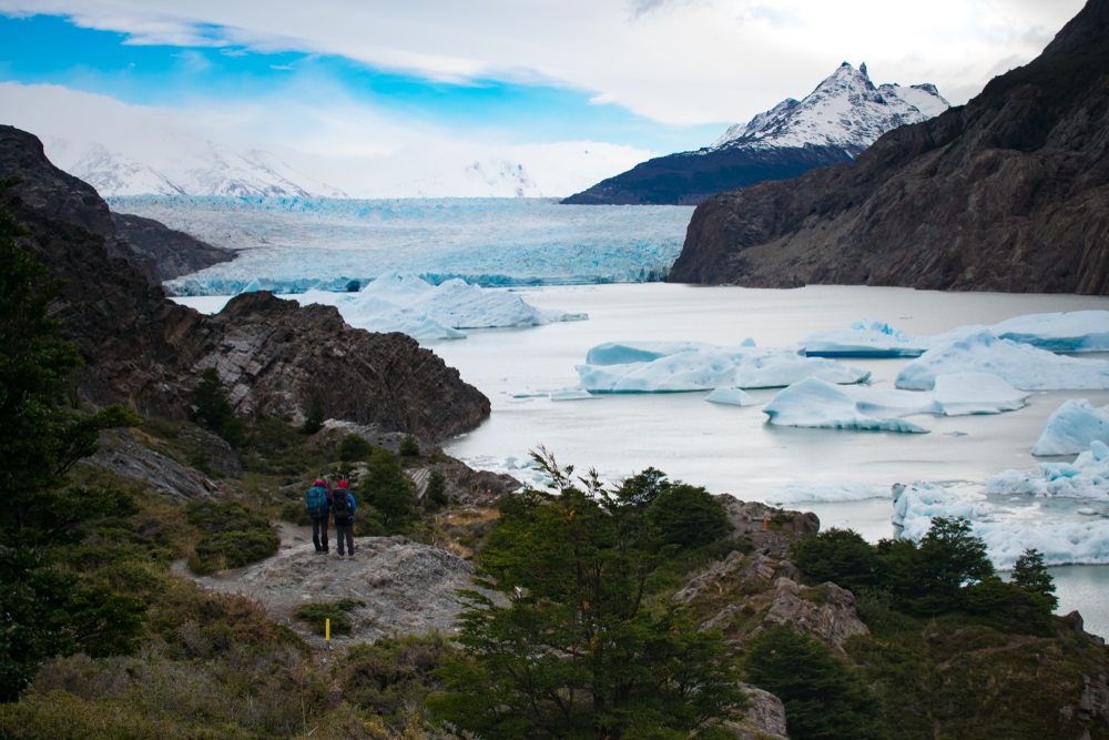 Hikers,Infront,Of,Glacier,Grey,,Torres,Del,Paine,National,Park,