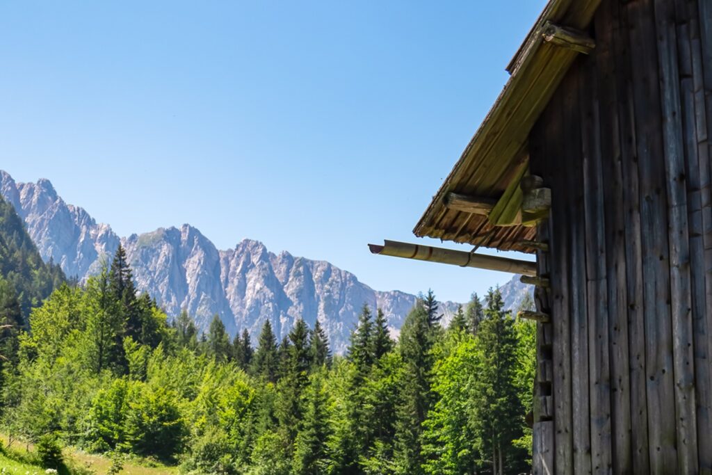 Wooden,Hut,With,Scenic,View,Of,Majestic,Mountain,Ridges,Of