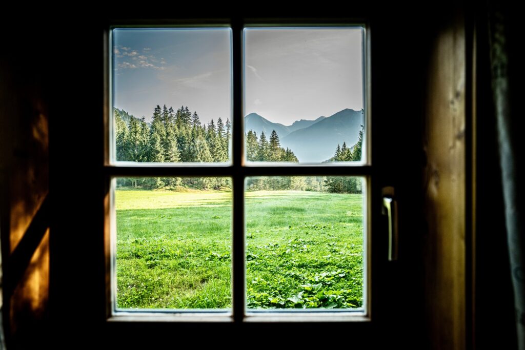 View,Through,A,Window,Of,The,Austrian,Alps